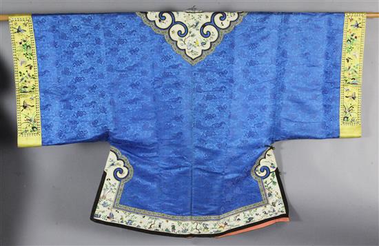 A Chinese embroidered blue silk brocade robe, early 20th century, length 99cm